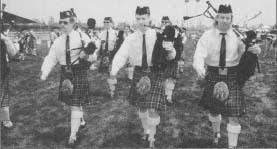 Participants enjoying a traditional Scottish Highland Games.