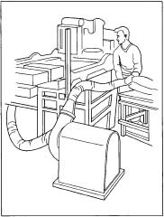 The blowing machine blows polyester filling into a pillow case.